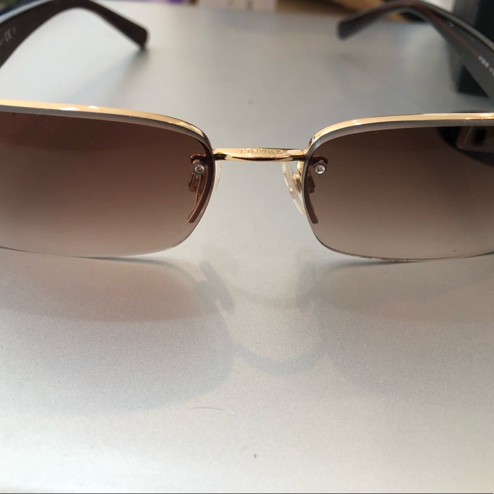Brown Chanel sunglasses…..I wore them maybe 4 times..pristine condition!